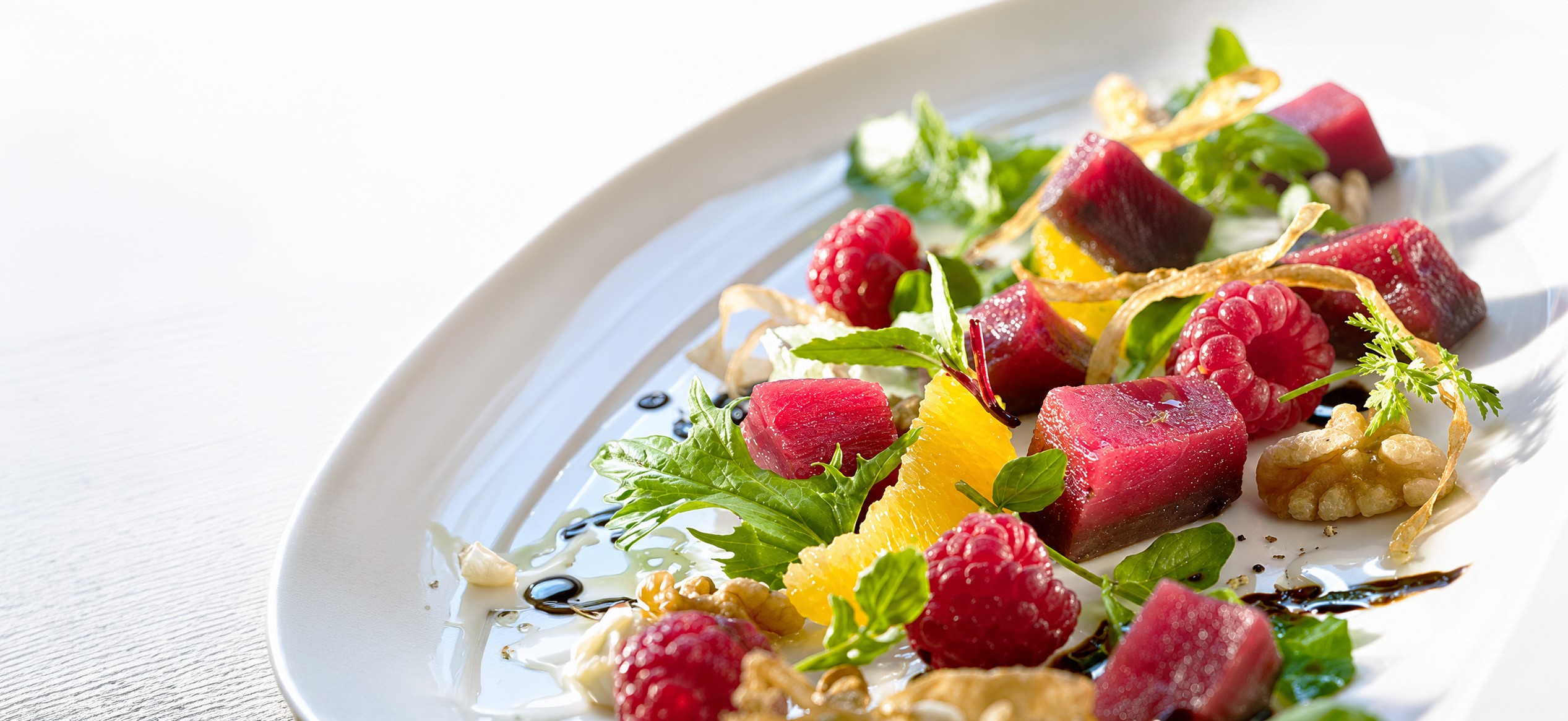 Brined and seared venison with berries and nuts Graham Brown